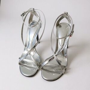 Alexander McQueen Shimmering Silver Strappy Heels 
Size 8.5 (US) or 38.5 (EU)
